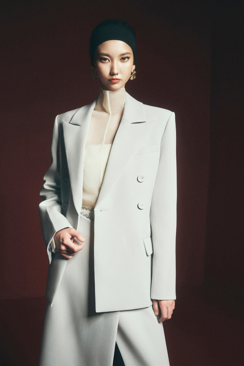 Grayson padded shoulder jacket by Maison Des Copains, featuring a stylish tailored design with padded shoulders and a sleek fit.