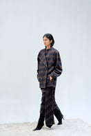 Ura Kari midi skirt with flowy fabric and stylish design, shown in a natural pose.