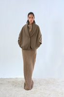 Elegant URA ALVA maxi dress with flowing fabric and stylish design, perfect for summer or special occasions.