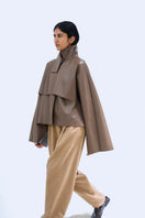 Gray Ura PIA trench jacket with classic collar and button closure, shown on a hanger.