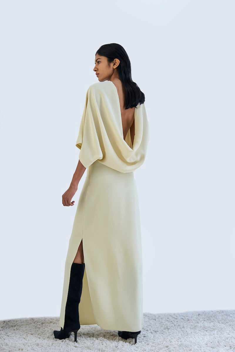 Elegant URA RUNA maxi dress featuring flowing fabric and a stylish design, perfect for casual or dressy occasions.