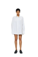 Blue DIMA shirt by URA, stylish button-up shirt with collar and long sleeves, displayed on a hanger.