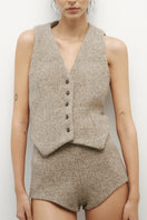 JC Pajares virgin wool vest with ceramic buttons, tailored fit and classic design, featuring a stylish and warm sleeveless top.