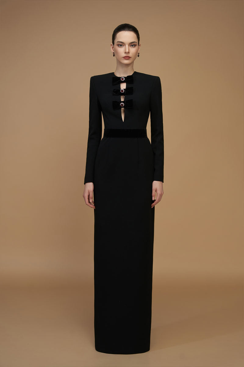 Elegant black crepe de chine and velvet gown by I.H.F with a V-cut neckline and long sleeves, perfect for formal occasions.