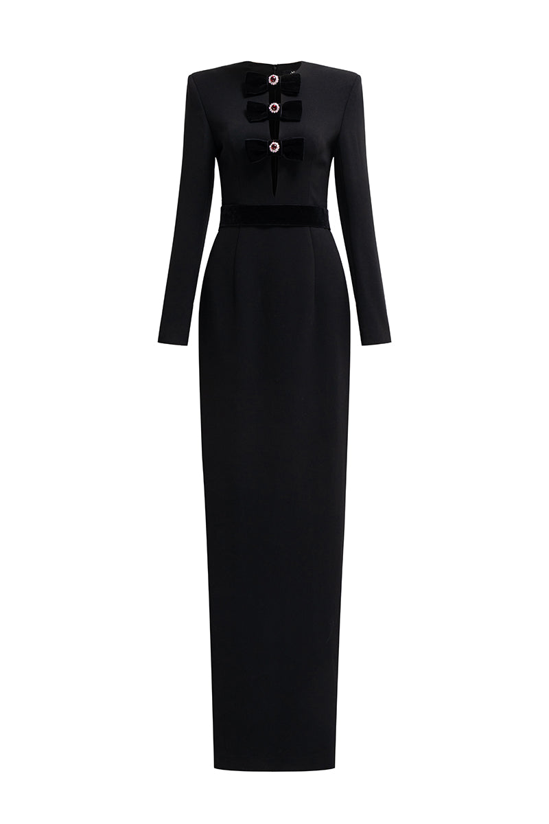 Black crepe de chine and velvet gown by I.H.F featuring a V-cut neckline and long sleeves, elegant evening wear.