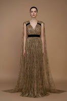 Green tie-dye metallic chiffon V-neck gown by I.H.F with ruffle back train and A-line silhouette.