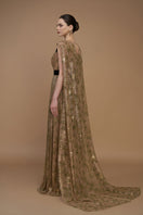 Green tie-dye metallic chiffon V-neck gown with A-line silhouette, ruffled back train, by I.H.F.