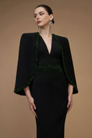 Black emerald gown by I.H.F featuring a V-neck, crepe and silk lining, with elegant cape sleeves, perfect for formal occasions.
