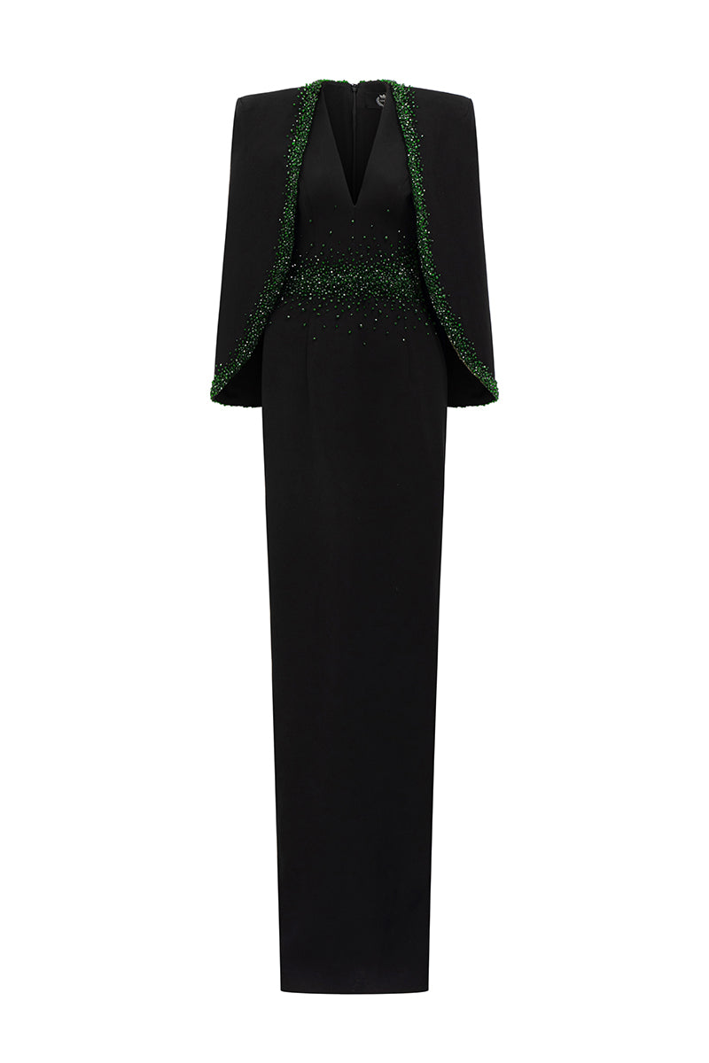 Black crepe and silk-lined emerald gown with V-neck, column silhouette, and cape sleeves by I.H.F displayed on a model.