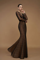 Black V-neck mermaid gown with long sleeves featuring intricate vine guipure lace and Lyon velvet from I.H.F.