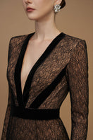 Black V-neck mermaid gown with lace and Lyon velvet by I.H.F, featuring long sleeves and elegant plunge design.