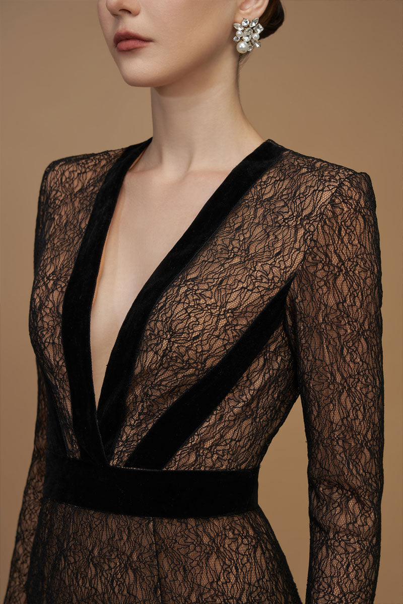 Black V-neck mermaid gown with lace and Lyon velvet by I.H.F, featuring long sleeves and elegant plunge design.