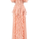 Peach fuzz silk ruffle maxi dress by 21Six featuring flowing fabric and layered ruffle details.