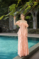 Peach silk ruffles maxi dress by 21Six featuring fuzzy fabric and flowing ruffle details, perfect for elegant summer wear.