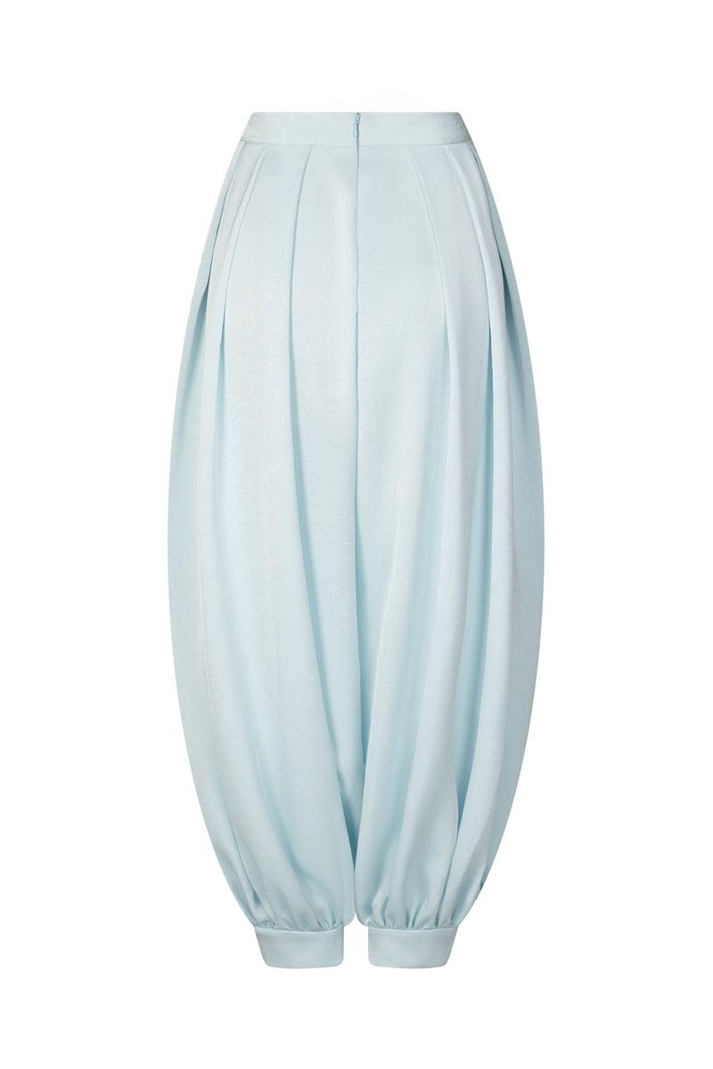 Sky blue balloon pants by Valenciani, featuring a relaxed, oversized fit with a unique balloon silhouette and elastic waistband.