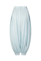 Sky blue balloon pants by Valenciani, featuring a relaxed, oversized fit with a unique balloon silhouette and elastic waistband.