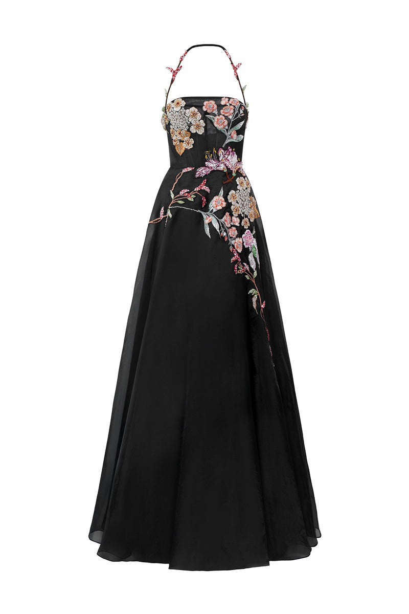 Black Tracy Studio maxi dress with organza floral bead embellishments, featuring a flowing silhouette and elegant design.