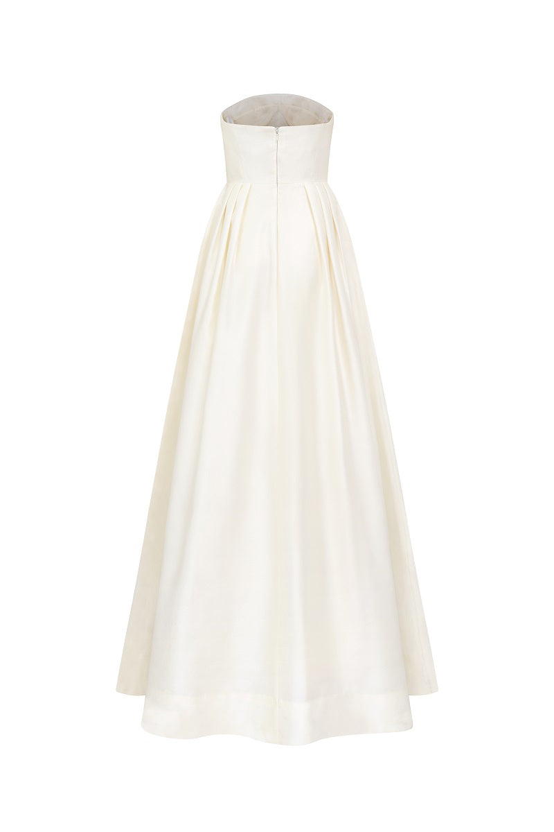 Off-white strapless taffeta A-line maxi dress by Tracy Studio, flowing fabric and elegant design perfect for formal occasions.