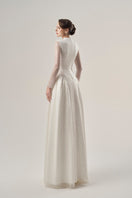 Beading lace high neck gown by Tracy Studio featuring intricate beaded lace fabric and a sophisticated high neckline.
