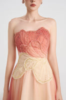 Elegant layered tulle gown by Tracy Studio featuring a flowing design with intricate details.