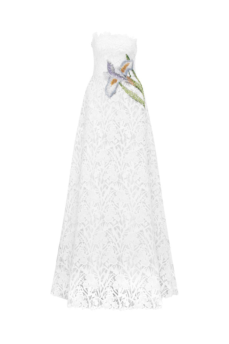 White lace beaded maxi dress by Tracy Studio featuring intricate beadwork and flowing fabric, perfect for elegant occasions.