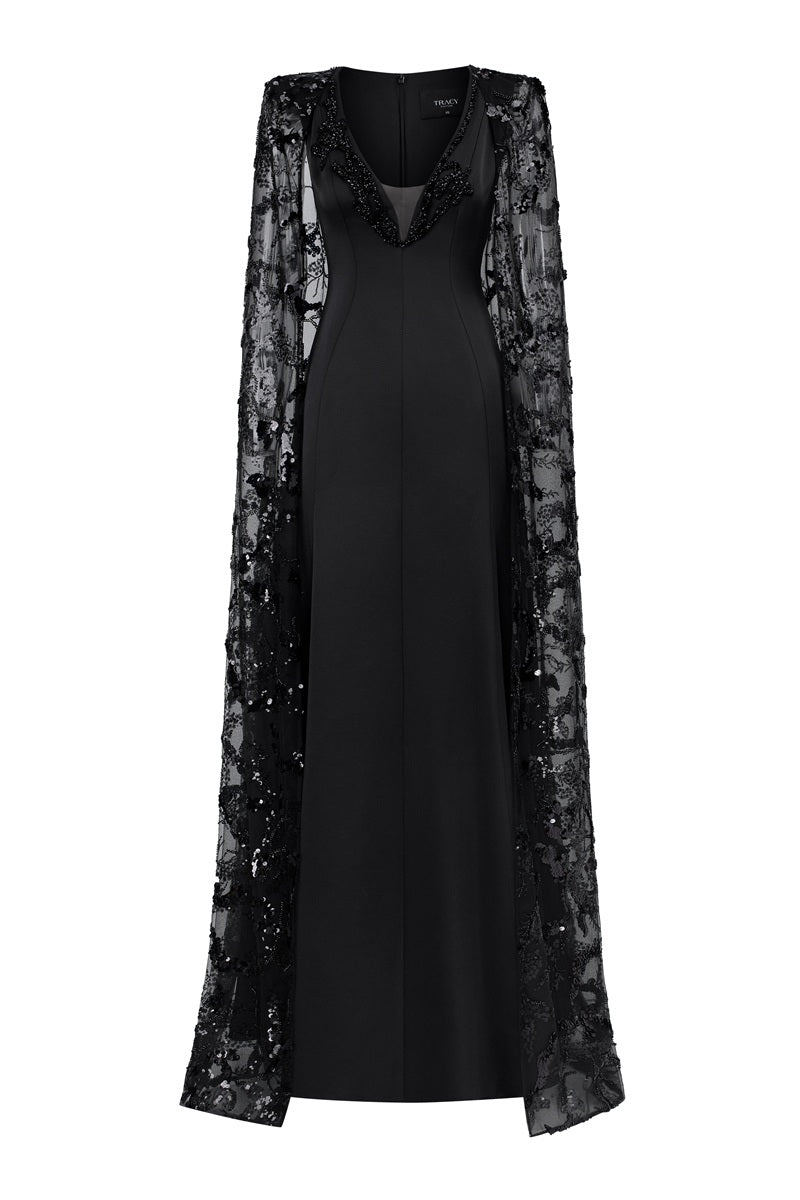 Black Taffeta Mikado deep V-neck maxi dress by Tracy Studio, shown on a model with flowing fabric and elegant design.
