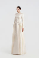 Long sleeve taffeta mikado gown by Tracy Studio, featuring a fitted bodice and elegant floor-length design.