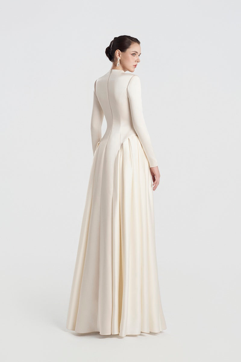 Long sleeve taffeta Mikado maxi dress by Tracy Studio featuring a fitted bodice and flowing skirt in elegant fabric.