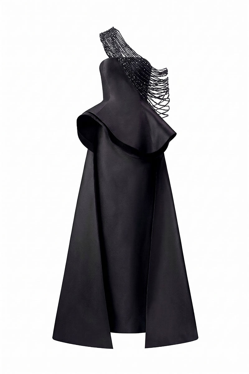 Black Tracy Studio taffeta bamboo peplum maxi dress displayed on a mannequin, showcasing elegant fabric and peplum design.