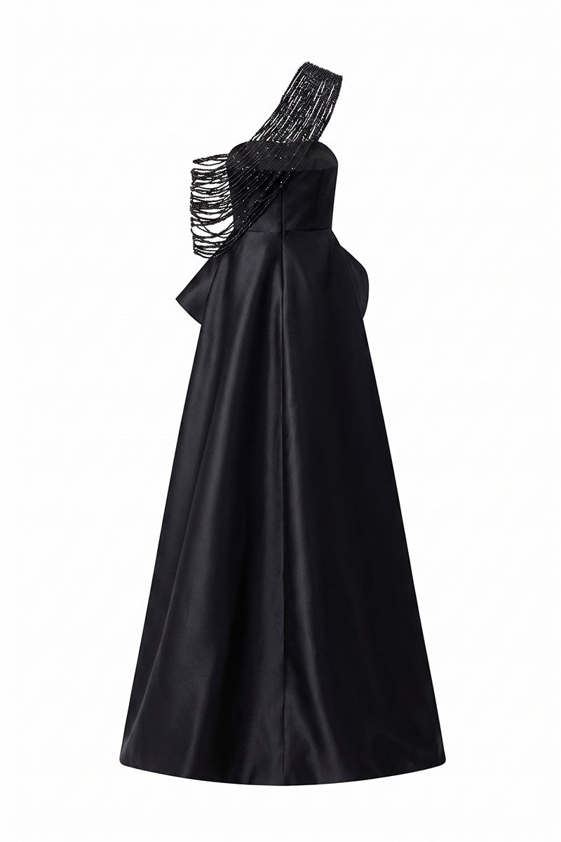 Black TAFFETA BAMBOO PEPLUM Maxi Dress by Tracy Studio, shown on a hanger with detailed fabric and peplum design.