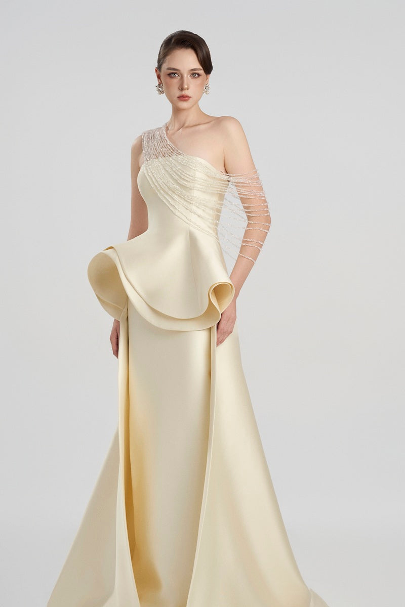Elegant Tracy Studio taffeta bamboo peplum maxi dress with a fitted bodice and flowing skirt, perfect for formal occasions.