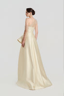 Elegant Tracy Studio taffeta bamboo peplum gown with fitted bodice and flowing skirt, perfect for formal occasions.