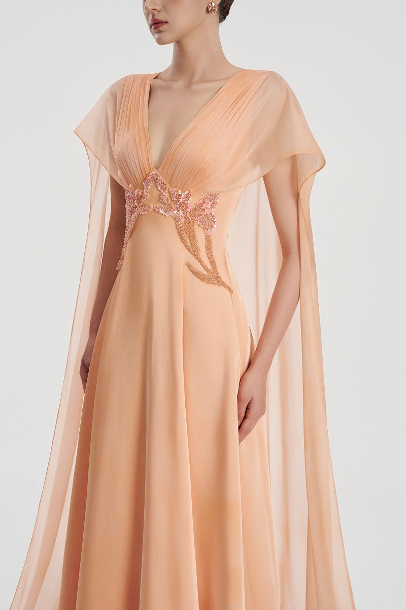 Black satin deep V-neck maxi dress by Tracy Studio, flowing fabric and elegant design perfect for formal occasions.