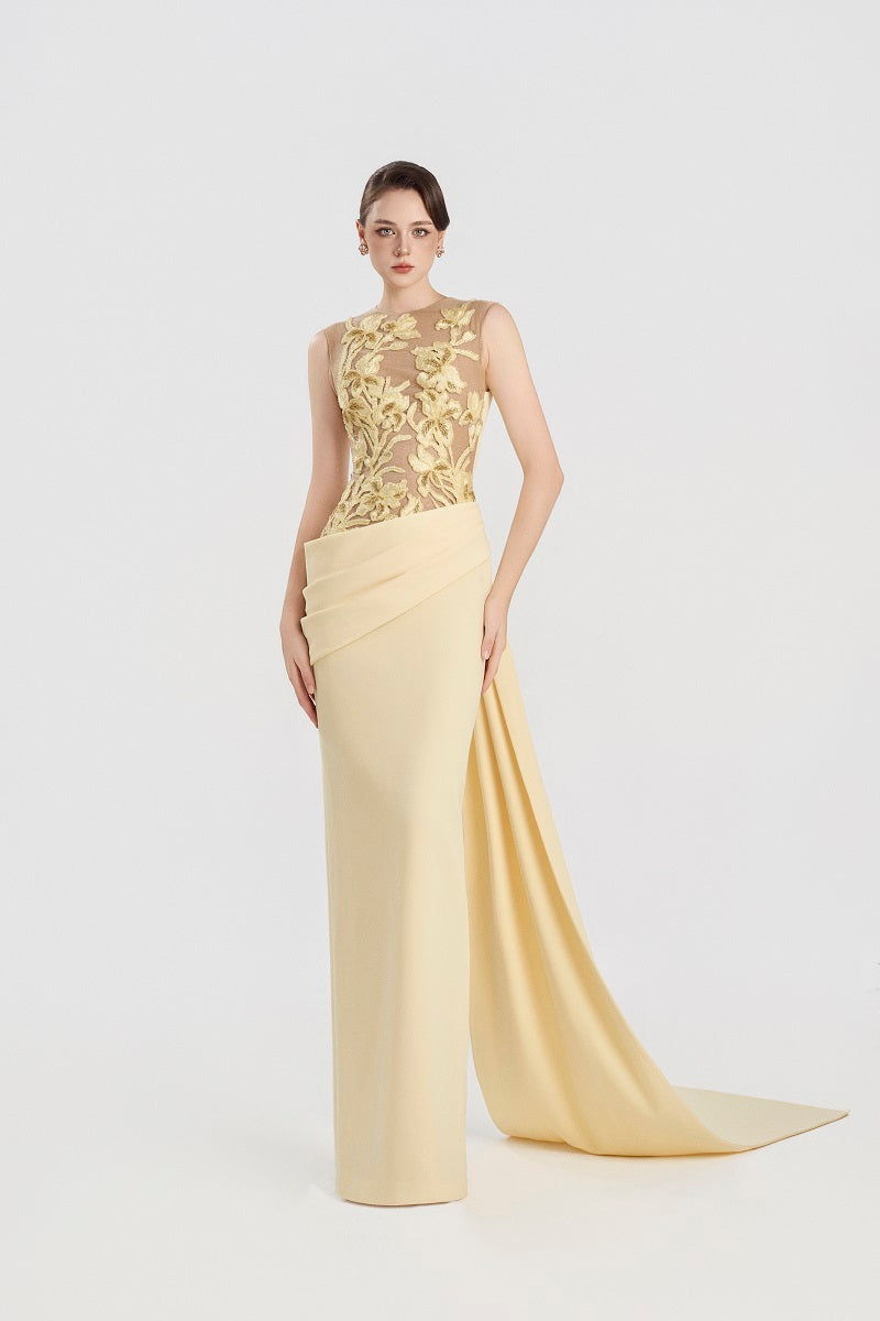 Yellow viscose matte maxi dress by Tracy Studio, flowing fabric and elegant design, displayed on a mannequin.