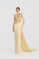 Yellow viscose matte gown by Tracy Studio, flowing design with a fitted waist and elegant long sleeves.