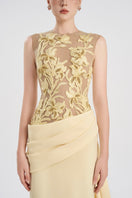 Yellow viscose matte gown by Tracy Studio, flowing fabric and elegant design, perfect for formal occasions.