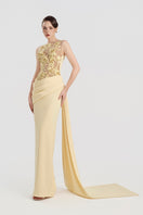 Yellow viscose matte gown by Tracy Studio featuring a flowing design and elegant silhouette.