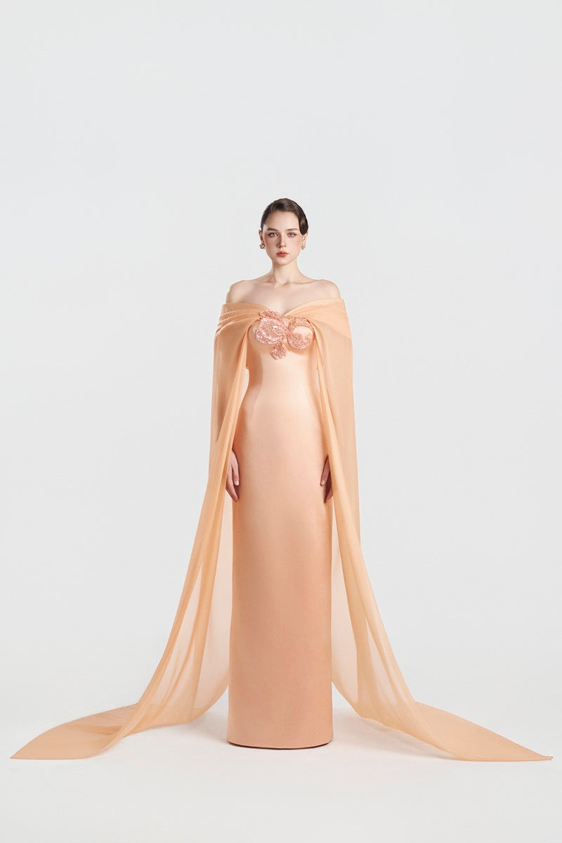 Apricot taffeta mikado maxi dress by Tracy Studio, elegant and flowing with a fitted bodice and full skirt.