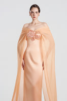 Elegant apricot taffeta mikado gown by Tracy Studio featuring a flowing design and luxurious fabric.