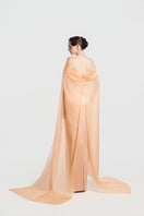 Elegant apricot taffeta mikado gown by Tracy Studio, showcasing a flowing silhouette with intricate detailing.