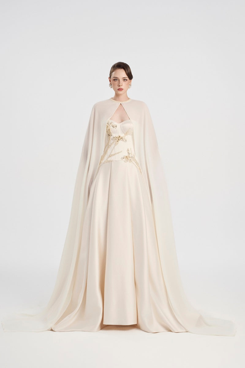 Off-white Tracy Studio taffeta mikado maxi dress with a flowing silhouette and elegant design.