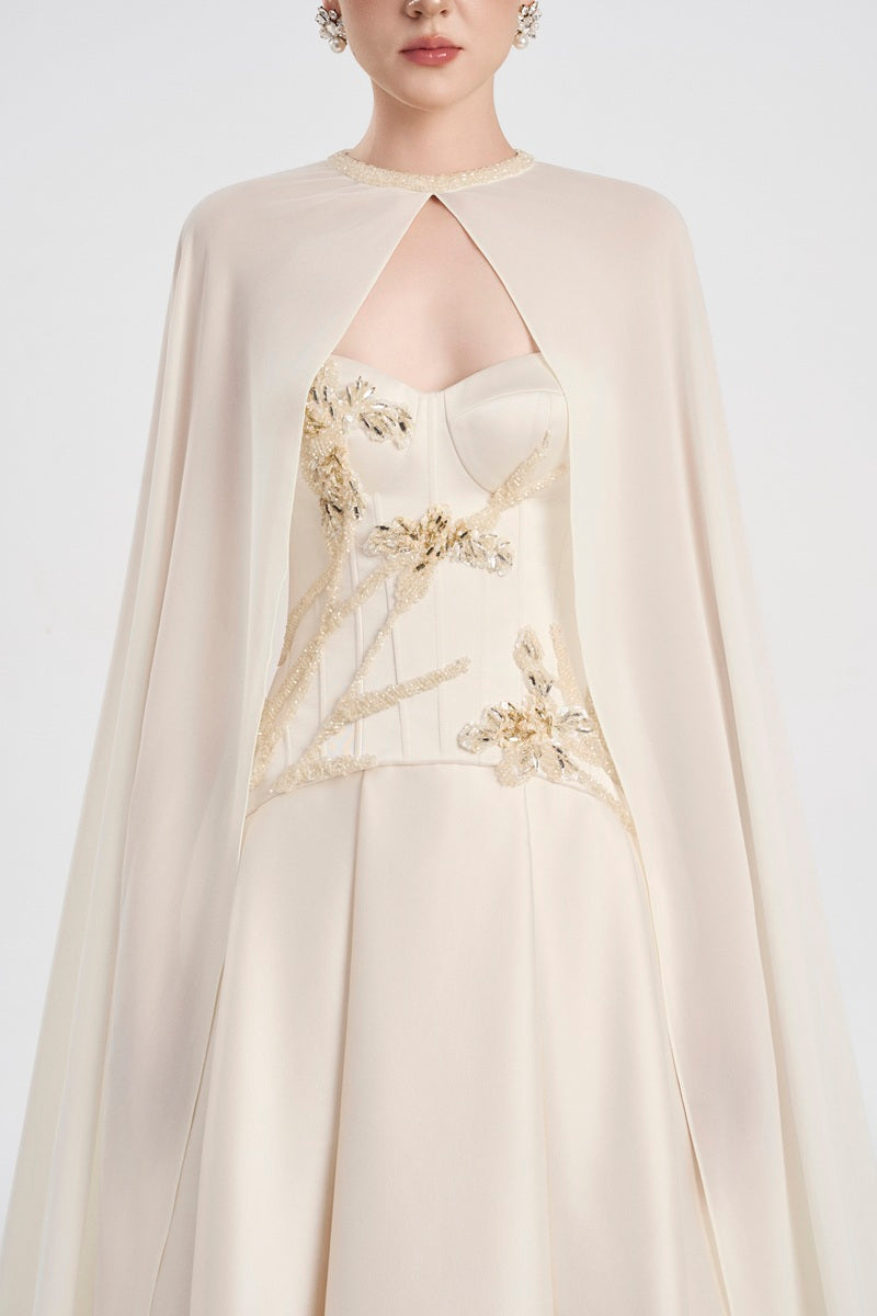 Off-white taffeta mikado maxi dress by Tracy Studio, featuring elegant, flowing fabric and a sophisticated design.