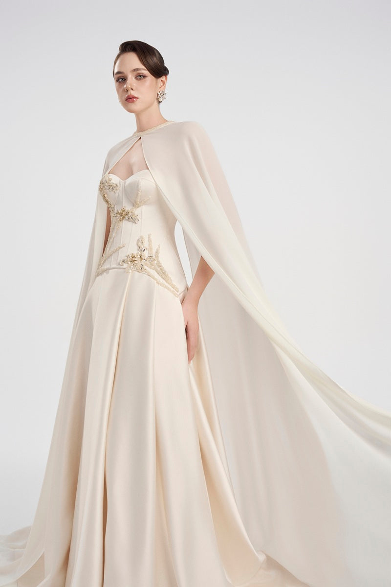 Off-white taffeta mikado maxi dress by Tracy Studio featuring elegant design and flowing fabric.