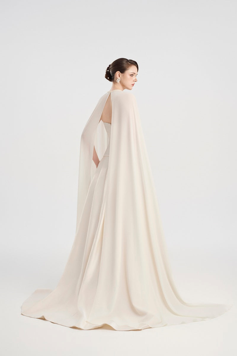 Off-white taffeta mikado maxi dress by Tracy Studio featuring a elegant, flowing design and structured silhouette.