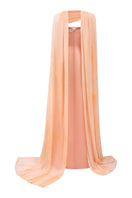 Elegant apricot taffeta mikado gown by Tracy Studio, showcasing its flowing fabric and sophisticated design.