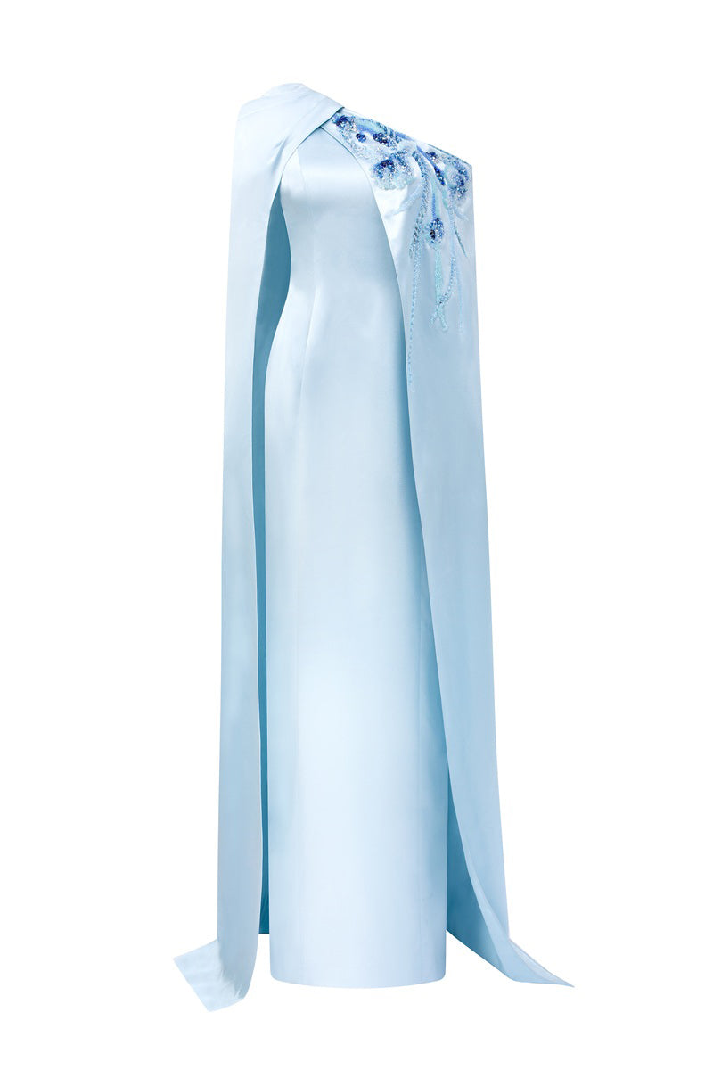 Blue asymmetrical taffeta maxi dress by Tracy Studio, featuring elegant draping and a flowing silhouette.