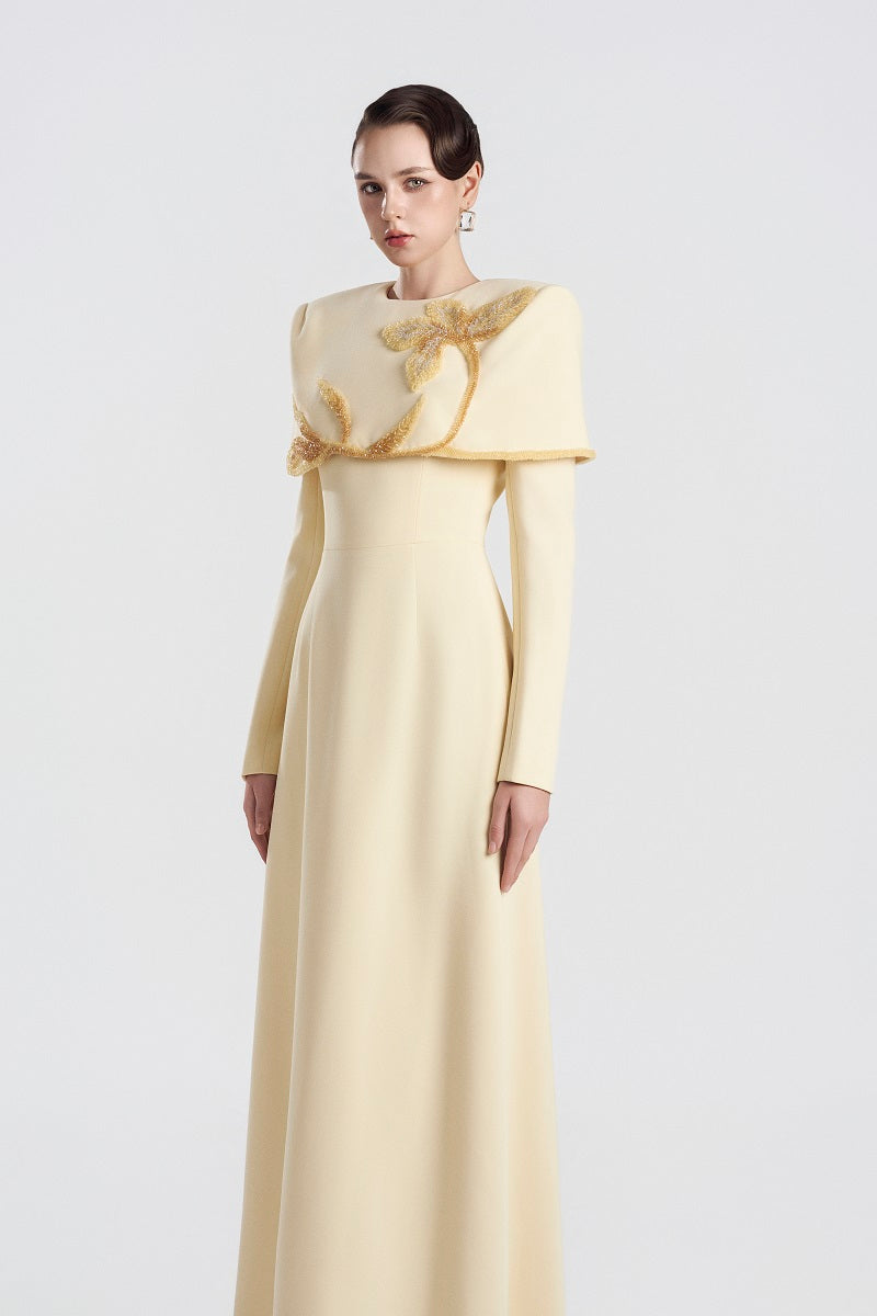 Yellow viscose maxi dress by Tracy Studio featuring a flowing silhouette and elegant design.