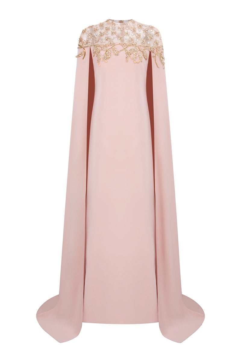 Apricot velvet satin maxi dress by Tracy Studio with a flowing silhouette and elegant design, perfect for formal occasions.