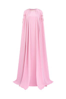 Pink velvet satin cape gown by Tracy Studio featuring a flowing design and elegant drape, perfect for formal occasions.