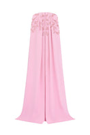 Pink velvet satin cape gown by Tracy Studio featuring a flowing, elegant design with a high neckline and long sleeves.